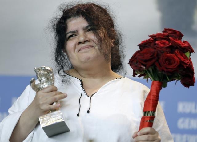 Dana Bunescu poses for the photographers with her Outstanding Artistic Contribution Silver Bear for the Film Ana, mon amour. (AP) Dana Bunescu poses for the photographers with her Outstanding Artistic Contribution Silver Bear for the Film Ana, mon amour. (AP)