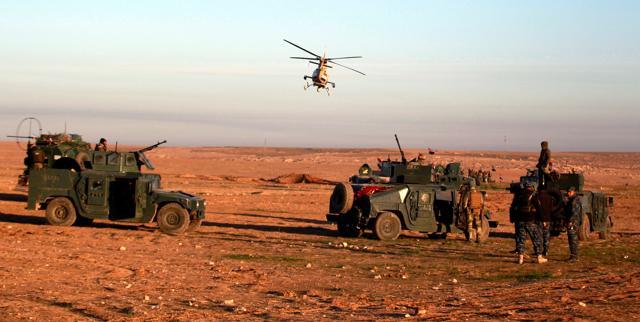 Iraqi security forces advance towards the western side of Mosul, Iraq on February 19, 2017. (Reuters Photo) Iraqi security forces advance towards the western side of Mosul, Iraq on February 19, 2017. (Reuters Photo)
