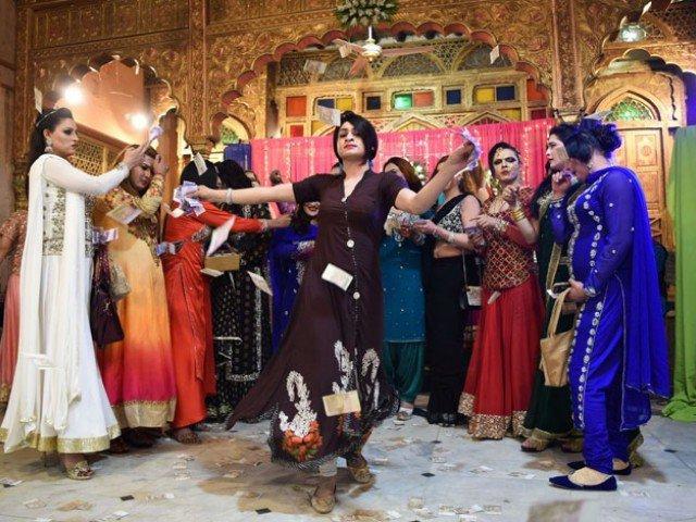 A group of khawajasiras dance at an event. (AFP) A group of khawajasiras dance at an event. (AFP)
