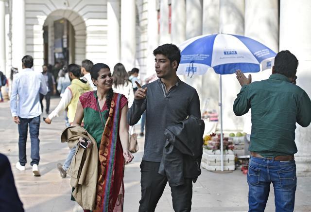People walking in the hot afternoon in Connaught Place in New Delhi on Monday, which was the hottest February day in a decade. (Ravi Choudhary/HT Photo) People walking in the hot afternoon in Connaught Place in New Delhi on Monday, which was the hottest February day in a decade. (Ravi Choudhary/HT Photo)