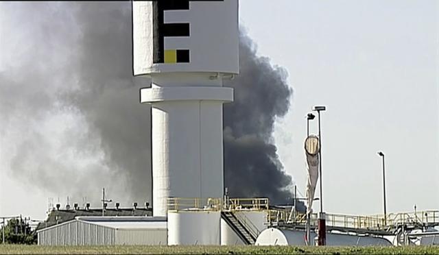 In this image made from video, smoke billows from the site of a plane crash near Essendon Airport in Melbourne. (AP Photo)