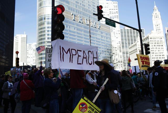 Demonstrators protest against US President Donald Trump outside Trump Tower on the one-month anniversary of his inauguration in Chicago, Illinois. (AFP Photo) Demonstrators protest against US President Donald Trump outside Trump Tower on the one-month anniversary of his inauguration in Chicago, Illinois. (AFP Photo)