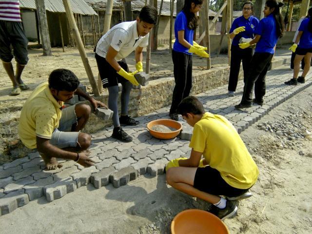 Assam Valley School students at work. (HT Photo) Assam Valley School students at work. (HT Photo)