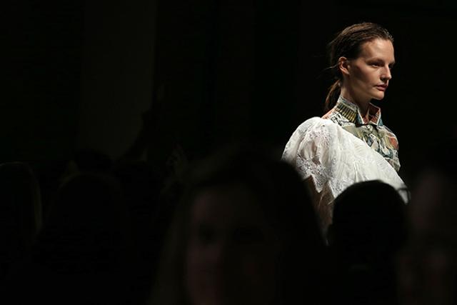 A model walking for Burberry. A model walking for Burberry.