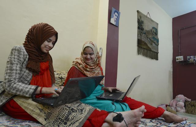 Life changed for Aiman Raza & Fiza Raza after they received laptops from chief minister Akhilesh Yadav. (Ashok Dutta/ HT Photo) Life changed for Aiman Raza & Fiza Raza after they received laptops from chief minister Akhilesh Yadav. (Ashok Dutta/ HT Photo)
