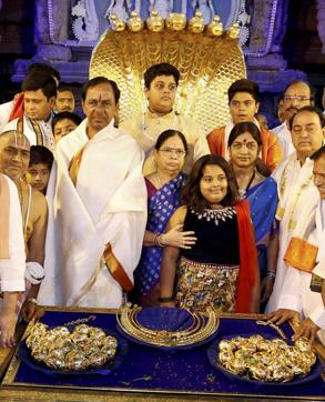 Telangana CM K Chandrasekhar Rao with his family members before donating ornaments worth Rs 5 crore at the golden holy flag mast of the temple of Lord Venkateswara at Tirumala in Tirupati on Wednesday. (PTI)