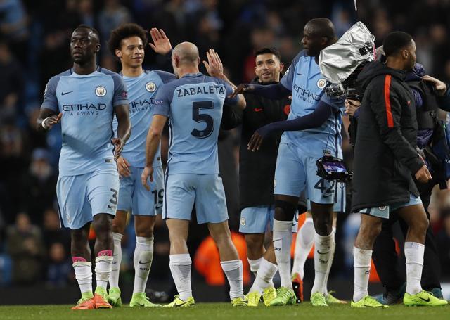 Manchester City's Leroy Sane and Pablo Zabaleta celebrate after the match. (REUTERS) Manchester City's Leroy Sane and Pablo Zabaleta celebrate after the match. (REUTERS)
