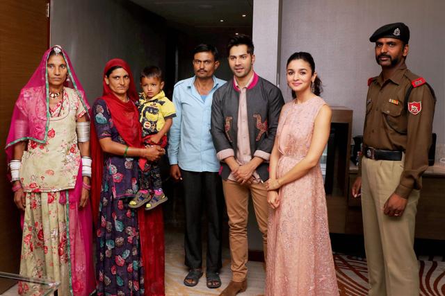 Varun Dhawan and Alia Bhatt meet with the family of Martyr Dharma Ram (Ashoka Chakra Awardee ) from Barmer district of Rajasthan during the promotional event of Badrinath Ki Dhulania, in Jaipur on Monday. (PTI) Varun Dhawan and Alia Bhatt meet with the family of Martyr Dharma Ram (Ashoka Chakra Awardee ) from Barmer district of Rajasthan during the promotional event of Badrinath Ki Dhulania, in Jaipur on Monday. (PTI)