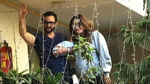 Saif Ali Khan and Kareena Kapoor with their newborn boy Taimur at their residence in Mumbai on December 22, 2016. (IANS)