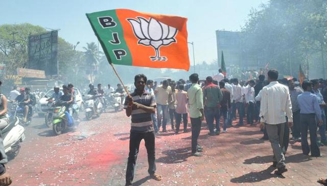 A party worker celebrates the win. (HT)