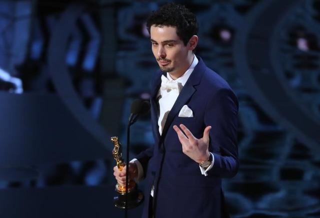 Damien Chazelle accepts the award for winning Best Director. Damien Chazelle accepts the award for winning Best Director.