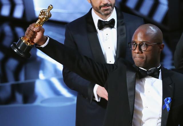 Director Barry Jenkins holds the Oscar as Moonlight wins Best Picture. (REUTERS) Director Barry Jenkins holds the Oscar as Moonlight wins Best Picture. (REUTERS)
