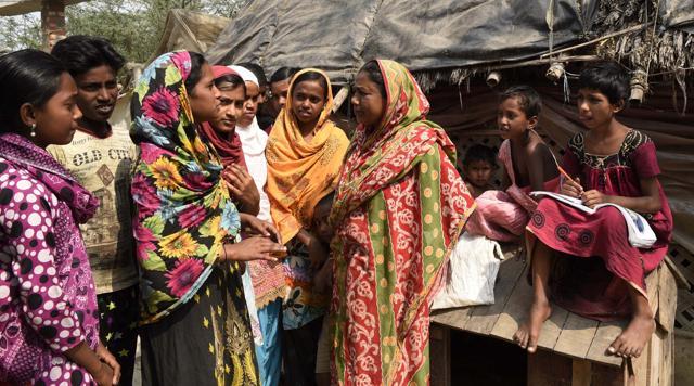 Members of the children’s team against trafficking speak to villagers in Sandeshkhali in South 24 Parganas in Kolkata. (Subhankar Chakraborty/HT Photo) Members of the children’s team against trafficking speak to villagers in Sandeshkhali in South 24 Parganas in Kolkata. (Subhankar Chakraborty/HT Photo)