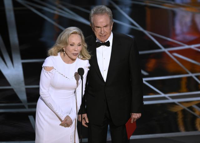 Faye Dunaway, left, and Warren Beatty present the award for best picture at the Oscars. (Chris Pizzello/Invision/AP)