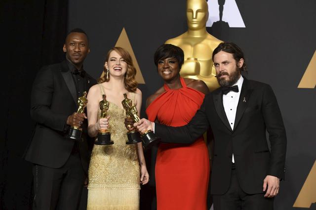 Mahershala Ali, winner of the award for best actor in a supporting role for "Moonlight", from left, Emma Stone, winner of the award for best actress in a leading role for "La La Land", Viola Davis, winner of the award for best actress in a supporting role for "Fences", and Casey Affleck, winner of the award for best actor in a leading role for "Manchester by the Sea", pose in the press room at the Oscars on Sunday. (AP) Mahershala Ali, winner of the award for best actor in a supporting role for "Moonlight", from left, Emma Stone, winner of the award for best actress in a leading role for "La La Land", Viola Davis, winner of the award for best actress in a supporting role for "Fences", and Casey Affleck, winner of the award for best actor in a leading role for "Manchester by the Sea", pose in the press room at the Oscars on Sunday. (AP)