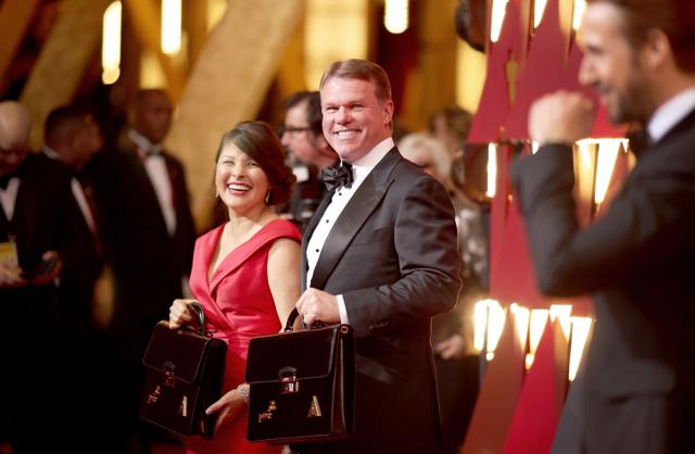 Representatives from PricewaterhouseCoopers, Martha L. Ruiz, Brian Cullinan with the winners’ name in the briefcases. (AFP) Representatives from PricewaterhouseCoopers, Martha L. Ruiz, Brian Cullinan with the winners’ name in the briefcases. (AFP)