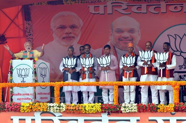 Prime Minister Narendra Modi addresses an election campaign rally in favour of BJP candidates in Maharajganj district on Wednesday. (PTI)