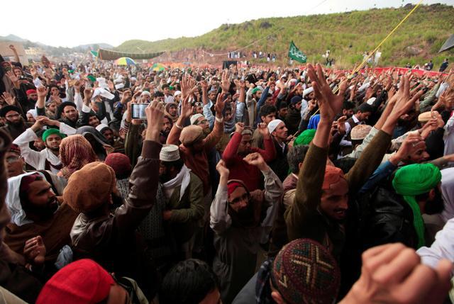 People chant slogans during a gathering to mark the anniversary of Mumtaz Qadri’s death. (REUTERS) People chant slogans during a gathering to mark the anniversary of Mumtaz Qadri’s death. (REUTERS)