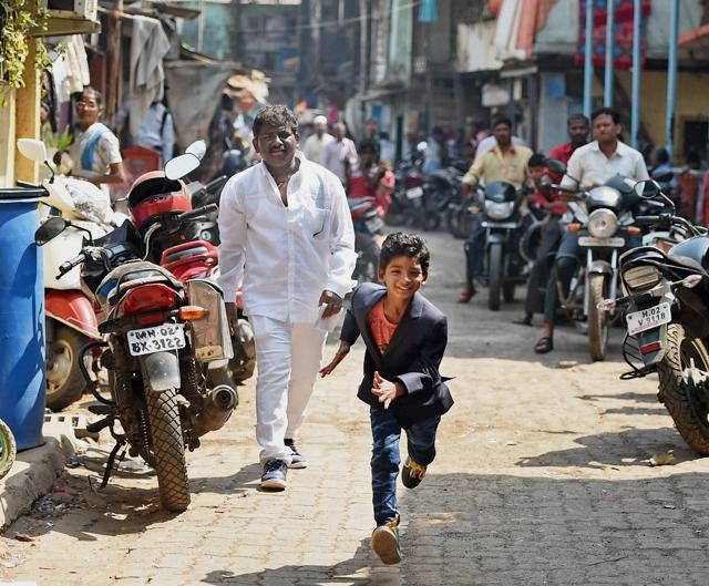Sunny Pawar runs as he arrives to attend a press meet in Mumbai on Wednesday. (PTI) Sunny Pawar runs as he arrives to attend a press meet in Mumbai on Wednesday. (PTI)