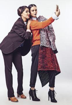 Nida is wearing an Kenzo x H&M sweater, a Zara suit and Chaussea shoes and Nitya is wearing a shirt and sweater from United Colors of Benetton, a Kenzo x H&M coat, Zara trousers and shoes from Koovs (ANAND GOGOI ) Nida is wearing an Kenzo x H&M sweater, a Zara suit and Chaussea shoes and Nitya is wearing a shirt and sweater from United Colors of Benetton, a Kenzo x H&M coat, Zara trousers and shoes from Koovs (ANAND GOGOI )