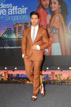 The Bollywood actor’s double-toned brogues complement his caramel-hued suit. (Viral Bhayani)