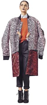 Nitya is wearing a shirt and sweater from United Colors of Benetton, a Kenzo x H&M coat, Zara trousers and shoes from Koovs (ANAND GOGOI) Nitya is wearing a shirt and sweater from United Colors of Benetton, a Kenzo x H&M coat, Zara trousers and shoes from Koovs (ANAND GOGOI)
