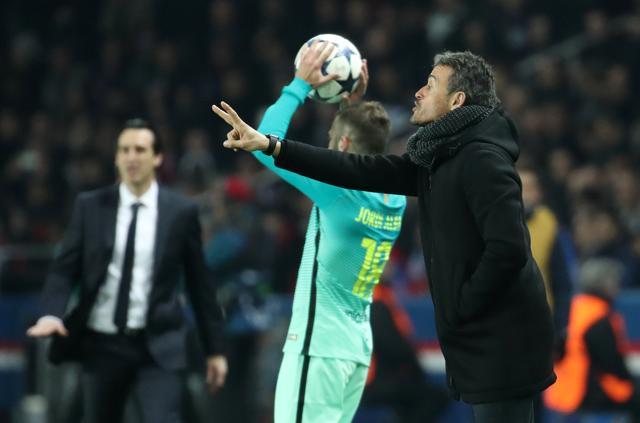 Barcelona coach Luis Enrique and Paris Saint-Germain coach Unai Emery during a Champions League match. (REUTERS)