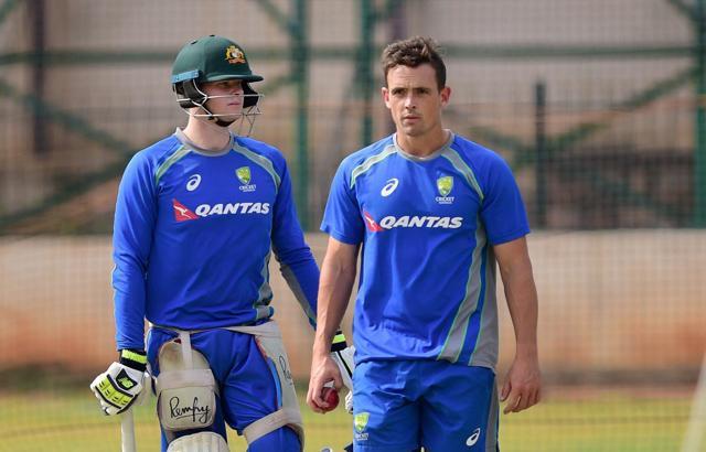 Steven Smith and Steve O'Keefe (right) during a training session ahead the Bangalore Test on Wednesday. (PTI)