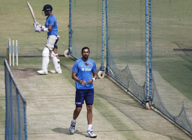 Ishant Sharma prepares to bowl to captain Virat Kohli during nets in Bangalore on Wednesday. (AP)