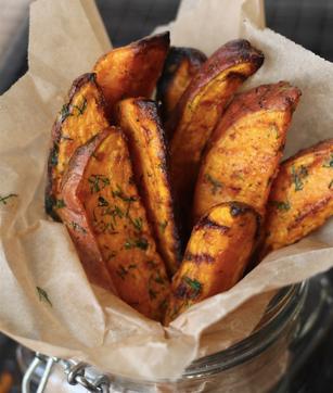 Looking for mouth-watering paleo dishes? Sample these garlic sweet potato wedges. (Pinterest) Looking for mouth-watering paleo dishes? Sample these garlic sweet potato wedges. (Pinterest)