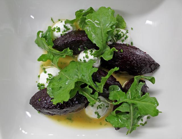 The pan-tossed beetroot gnocchi with a feta paté and crisp rocket salad is flavoured, textured and everything a good main course should be. (Satyabrata Tripathy/ Hindustan Times)