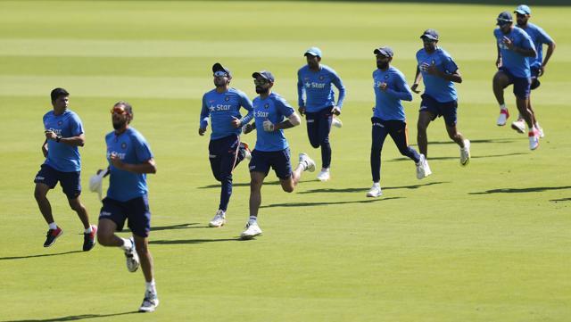 Indian cricketers warm up during a training session ahead of their second cricket test match against Australia in Bangalore. (AP) Indian cricketers warm up during a training session ahead of their second cricket test match against Australia in Bangalore. (AP)
