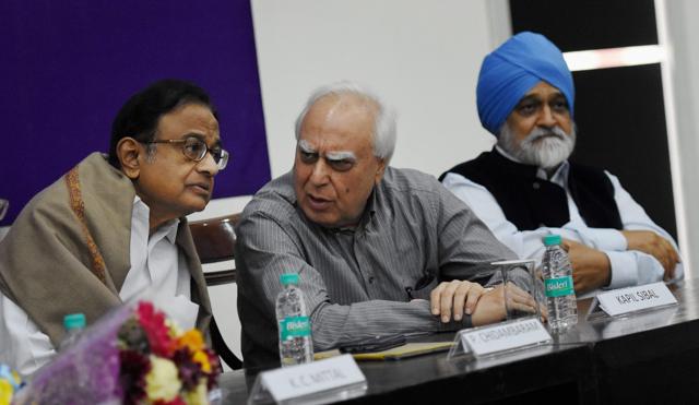 Former finance minister P Chidambaram along with Congress leader Kapil Sibal and former Planning Commission deputy chairman Montek Singh Ahluwalia at a seminar on ‘Untold Stories of Demonetisation’ in New Delhi on Friday. (PTI) Former finance minister P Chidambaram along with Congress leader Kapil Sibal and former Planning Commission deputy chairman Montek Singh Ahluwalia at a seminar on ‘Untold Stories of Demonetisation’ in New Delhi on Friday. (PTI)