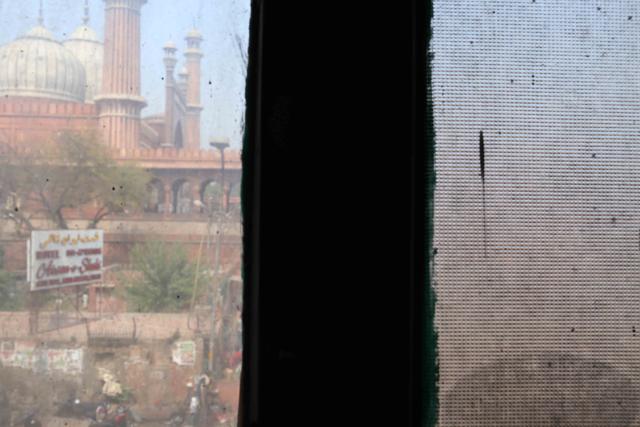 The Haji Hotel faces Jama Masjid and its balcony offers a panoramic view of the great Mughal-era mosque . The Haji Hotel faces Jama Masjid and its balcony offers a panoramic view of the great Mughal-era mosque .