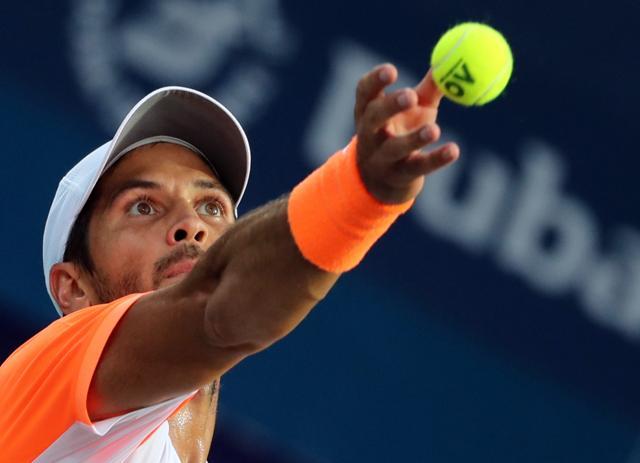 Fernando Verdasco of Spain serves the ball to Robin Haase of Netherlands during their ATP semi-final tennis match in Dubai on Friday. (AFP) Fernando Verdasco of Spain serves the ball to Robin Haase of Netherlands during their ATP semi-final tennis match in Dubai on Friday. (AFP)