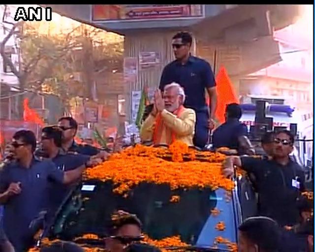 Prime Minister Narendra Modi during his road show in Varanasi on Sunday. (ANI Twitter) Prime Minister Narendra Modi during his road show in Varanasi on Sunday. (ANI Twitter)