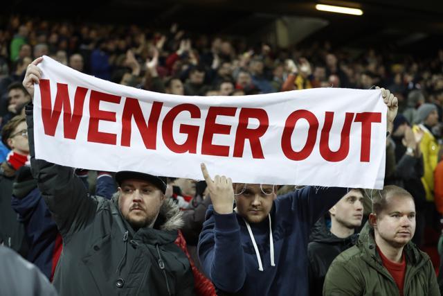 Arsenal fans protest with a banner against manager Arsene Wenger. (REUTERS)