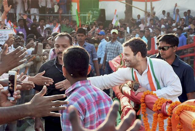 Rahul Gandhi reaches out to supporters during a rally in Jaunpur on Sunday. (PTI) Rahul Gandhi reaches out to supporters during a rally in Jaunpur on Sunday. (PTI)