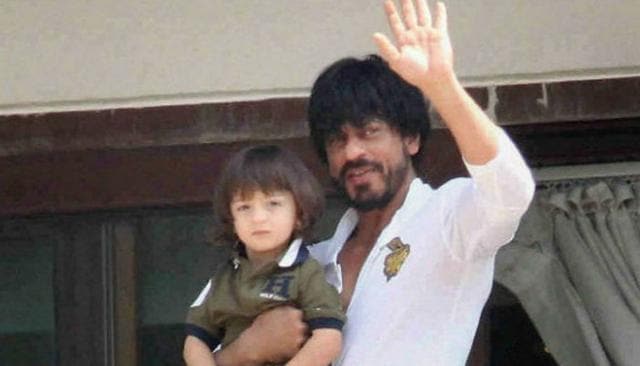 Shah Rukh Khan has said his son AbRam loves waving to fans. Shah Rukh Khan has said his son AbRam loves waving to fans.