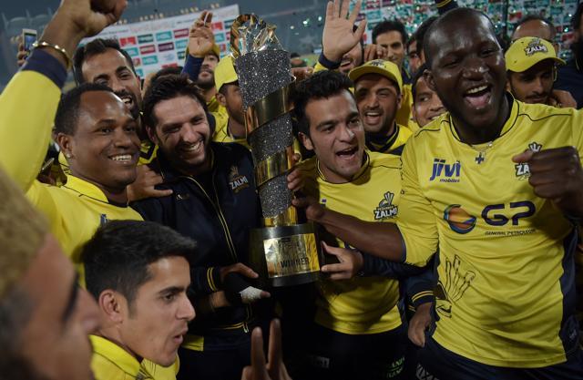 Cricketers of Peshawar Zalmi their victory over Quetta Gladiators in the final cricket match of the Pakistan Super League (PSL) at the Gaddafi Cricket Stadium in Lahore on Sunday. West Indians Darren Sammy and Marlon Samuels were part of Peshawar squad. (AFP) Cricketers of Peshawar Zalmi their victory over Quetta Gladiators in the final cricket match of the Pakistan Super League (PSL) at the Gaddafi Cricket Stadium in Lahore on Sunday. West Indians Darren Sammy and Marlon Samuels were part of Peshawar squad. (AFP)