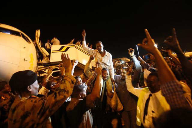 A freed Sudanese prisoner, who had been captured by the rebel Sudan People's Liberation Movement-North (SPLM-N), reacts upon his arrival at Khartoum airport on March 5. (AFP Photo)