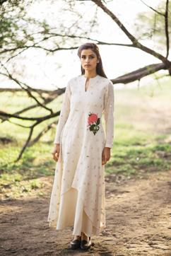 This ankle-length two-layered dress by designer Purvi Doshi fits the shape of the body so well that every woman would love to wear it. This ankle-length two-layered dress by designer Purvi Doshi fits the shape of the body so well that every woman would love to wear it.