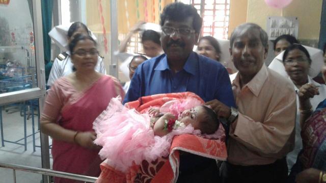 Rani on the lap of the chief medical officer of health of West Midnapore district. (HT Photo) Rani on the lap of the chief medical officer of health of West Midnapore district. (HT Photo)
