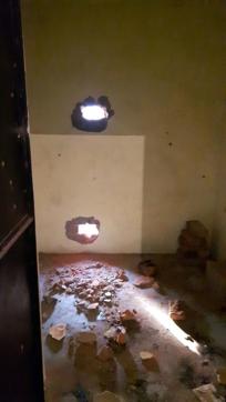 Holes created by the Uttar Pradesh Police to send in optical fibre cameras into a building where they said an Islamic State-inspired militant was hiding. (ATS handout) Holes created by the Uttar Pradesh Police to send in optical fibre cameras into a building where they said an Islamic State-inspired militant was hiding. (ATS handout)
