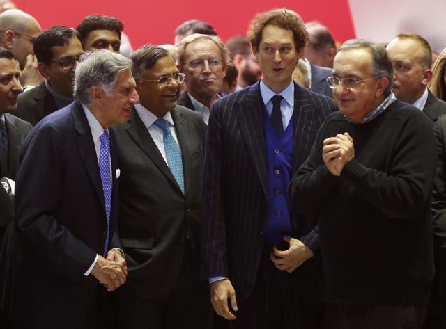 (L-R) Tata Group chairman emeritus Ratan Tata, chairman of Tata Sons Natarajan Chandrasekaran, Fiat Chrysler chairman John Elkann and Fiat Chrysler CEO Sergio Marchionne talk during presentation of the new Ferrari 812 Superfast during the 87th International Motor Show at Palexpo in Geneva. (Reuters) (L-R) Tata Group chairman emeritus Ratan Tata, chairman of Tata Sons Natarajan Chandrasekaran, Fiat Chrysler chairman John Elkann and Fiat Chrysler CEO Sergio Marchionne talk during presentation of the new Ferrari 812 Superfast during the 87th International Motor Show at Palexpo in Geneva. (Reuters)