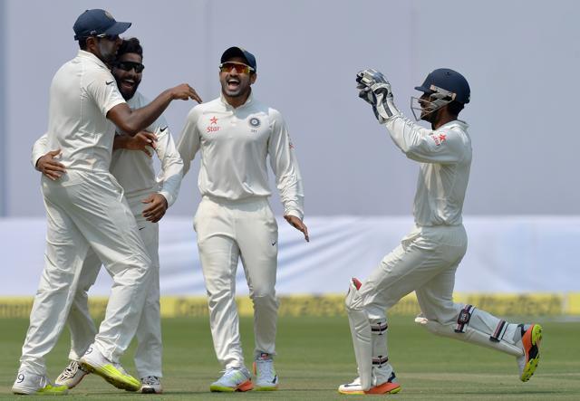 Ravindra Jadeja (2L) and Ravichandran Ashwin celebrate with teammates after the dismissal of Australian batsman Peter Handscomb at the Chinnaswamy Stadium in Bangalore on March 5. (AFP) Ravindra Jadeja (2L) and Ravichandran Ashwin celebrate with teammates after the dismissal of Australian batsman Peter Handscomb at the Chinnaswamy Stadium in Bangalore on March 5. (AFP)
