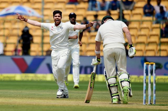 Umesh Yadav celebrates the wicket of Steve Smith during the fourth day of the second Test match between India and Australia at Chinnaswamy stadium in Bengaluru on Tuesday. (PTI) Umesh Yadav celebrates the wicket of Steve Smith during the fourth day of the second Test match between India and Australia at Chinnaswamy stadium in Bengaluru on Tuesday. (PTI)