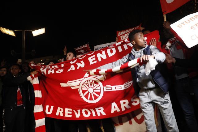 Fans reach after Arsenal’s 5-1 defeat against Bayern Munich in the UEFA Champions League. (REUTERS) Fans reach after Arsenal’s 5-1 defeat against Bayern Munich in the UEFA Champions League. (REUTERS)