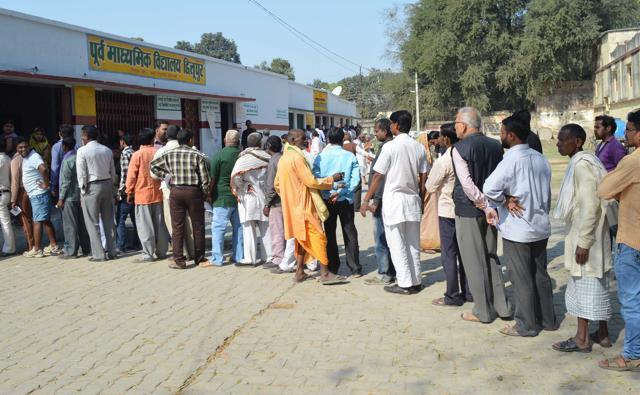 People wait in queue to caste their vote for Assembly elections, in Varanasi, Uttar Pradesh, March 8, 2017. (Adarsh Gupta / HT Photo ) People wait in queue to caste their vote for Assembly elections, in Varanasi, Uttar Pradesh, March 8, 2017. (Adarsh Gupta / HT Photo )