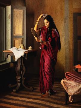 Lady with the Mirror Combing Her Hair (Saloni Puri), archival pigment print, edition of 10, from the series Raja Ravi Varma. (Rohit Chawla/Courtesy Tasveer) Lady with the Mirror Combing Her Hair (Saloni Puri), archival pigment print, edition of 10, from the series Raja Ravi Varma. (Rohit Chawla/Courtesy Tasveer)